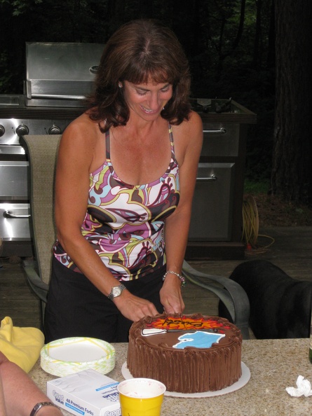 10 Debra cutting cake.JPG